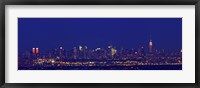 Buildings in a city lit up at night, Upper Manhattan, Manhattan, New York City, New York State, USA Fine Art Print
