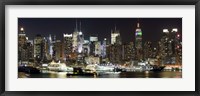 Buildings in a city lit up at night, Hudson River, Midtown Manhattan, Manhattan, New York City, New York State, USA Fine Art Print