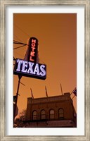 Low angle view of a neon sign of a hotel lit up at dusk, Fort Worth Stockyards, Fort Worth, Texas, USA Fine Art Print