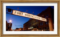 Signboard over a road at dusk, Fort Worth Stockyards, Fort Worth, Texas, USA Fine Art Print