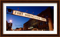 Signboard over a road at dusk, Fort Worth Stockyards, Fort Worth, Texas, USA Fine Art Print