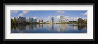 Reflection of buildings in a lake, Lake Eola, Orlando, Orange County, Florida, USA 2010 Fine Art Print