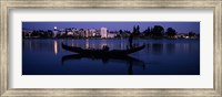 Boat in a lake with city in the background, Lake Merritt, Oakland, Alameda County, California, USA Fine Art Print