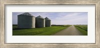 Three silos in a field Fine Art Print