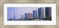 Skyscrapers at the waterfront with a tower in the background, Seine River, Eiffel Tower, Paris, Ile-De-France, France Fine Art Print