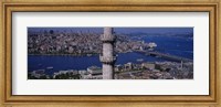 Mid section view of a minaret with bridge across the bosphorus in the background, Istanbul, Turkey Fine Art Print