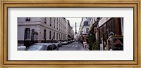 Buildings along a street with the Eiffel Tower in the background, Paris, France Fine Art Print