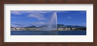 Fountain in front of buildings, Jet D'eau, Geneva, Switzerland Fine Art Print