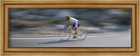 Bike racer participating in a bicycle race, Sitges, Barcelona, Catalonia, Spain Fine Art Print