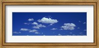 Clouds against a deep blue sky Fine Art Print