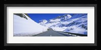 Empty road passing through a polar landscape, Route 3, Graubunden, Switzerland Fine Art Print