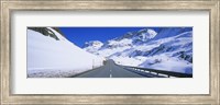 Empty road passing through a polar landscape, Route 3, Graubunden, Switzerland Fine Art Print
