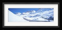 Snow covered mountains on both sides of a road, St Moritz, Graubunden, Switzerland Fine Art Print