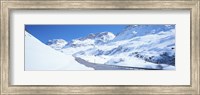 Snow covered mountains on both sides of a road, St Moritz, Graubunden, Switzerland Fine Art Print
