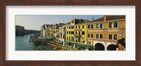 Tourists looking at gondolas in a canal, Venice, Italy Fine Art Print