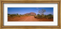 Desert Road And Ayers Rock, Australia Fine Art Print