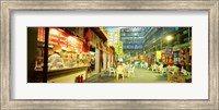 Group of people sitting outside a restaurant, Beijing, China Fine Art Print