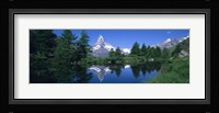 Reflection of a snow covered mountain near a lake, Grindjisee, Matterhorn, Zermatt, Switzerland Fine Art Print