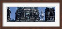 Low angle view of a church, Berliner Dom, with Television Tower (Fernsehturm) in distance, Berlin, Germany Fine Art Print