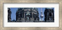 Low angle view of a church, Berliner Dom, with Television Tower (Fernsehturm) in distance, Berlin, Germany Fine Art Print