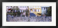 Low Angle View Of A Group Of People Sitting On A Wall, Tubingen, Baden-Wurttemberg, Germany Fine Art Print