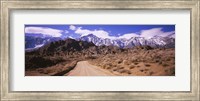 Dirt road passing through an arid landscape, Lone Pine, Californian Sierra Nevada, California, USA Fine Art Print