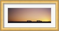 Silhouette of two trucks moving on a highway, Interstate 5, California, USA Fine Art Print