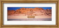 Bench in front of rocks, Red Rock Canyon State Park, Nevada, USA Fine Art Print