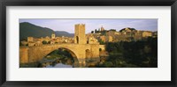 Arch bridge across a river in front of a city, Besalu, Catalonia, Spain Fine Art Print