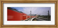 Red Train on railroad tracks, Central Station, Berlin, Germany Fine Art Print