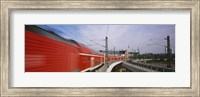 Red Train on railroad tracks, Central Station, Berlin, Germany Fine Art Print