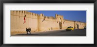 Car on a road in front of a fortified wall, Medina, Kairwan, Tunisia Fine Art Print