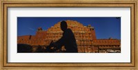 Silhouette of a person riding a motorcycle in front of a palace, Hawa Mahal, Jaipur, Rajasthan, India Fine Art Print