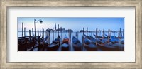 Row of gondolas moored near a jetty, Venice, Italy Fine Art Print