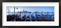 Row of gondolas moored near a jetty, Venice, Italy Fine Art Print