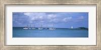 Boats in the sea with a lighthouse in the background, Nassau Harbour Lighthouse, Nassau, Bahamas Fine Art Print