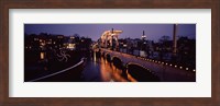 Bridge lit up at night, Magere Brug, Amsterdam, Netherlands Fine Art Print
