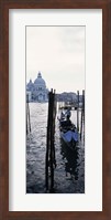 Gondolier in a gondola with a cathedral in the background, Santa Maria Della Salute, Venice, Veneto, Italy Fine Art Print