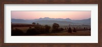 Agricultural field with a mountain range in the background, Transylvania, Romania Fine Art Print