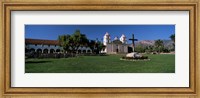 Cross with a church in the background, Mission Santa Barbara, Santa Barbara, California, USA Fine Art Print