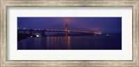 Suspension bridge lit up at dawn viewed from fishing pier, Golden Gate Bridge, San Francisco Bay, San Francisco, California, USA Fine Art Print