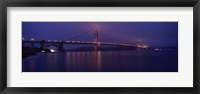 Suspension bridge lit up at dawn viewed from fishing pier, Golden Gate Bridge, San Francisco Bay, San Francisco, California, USA Fine Art Print