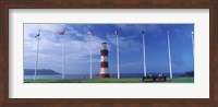 Lighthouse with flags on the coast, Smeaton's Tower, Plymouth Hoe, Plymouth, Devon, England Fine Art Print
