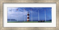 Lighthouse with flags on the coast, Smeaton's Tower, Plymouth Hoe, Plymouth, Devon, England Fine Art Print