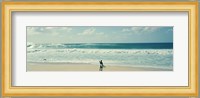 Surfer standing on the beach, North Shore, Oahu, Hawaii Fine Art Print