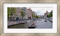 Tourboats in a canal, Amsterdam, Netherlands Fine Art Print