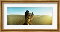 Row of people riding camels through the desert, Sahara Desert, Morocco Fine Art Print