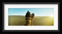 Row of people riding camels through the desert, Sahara Desert, Morocco Fine Art Print