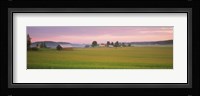 Barn and wheat field across farmlands at dawn, Finland Fine Art Print