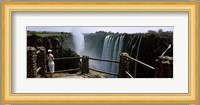 Woman looking at the Victoria Falls from a viewing point, Zambia Fine Art Print